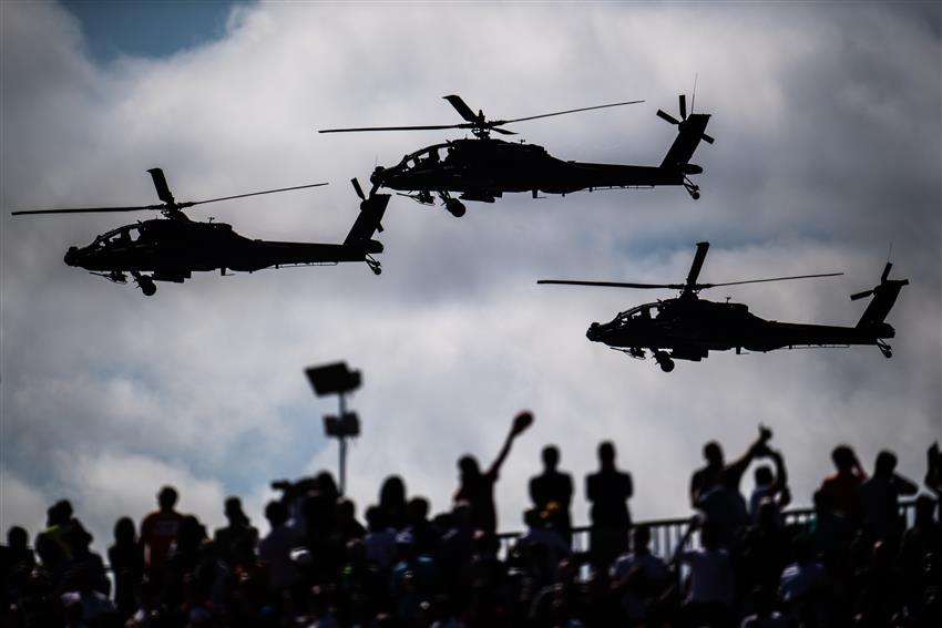 three Military Helicopters on display at the Austin Grand prix
