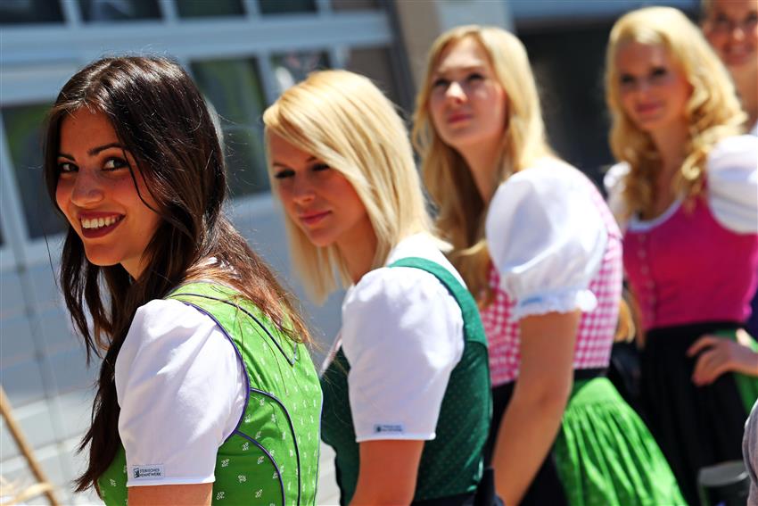 Four smiling grid girls