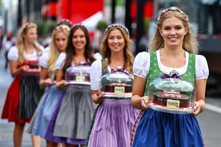 Austrian girls holding trays