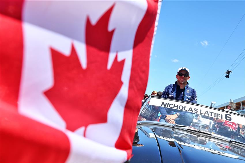 Canadian flag and car