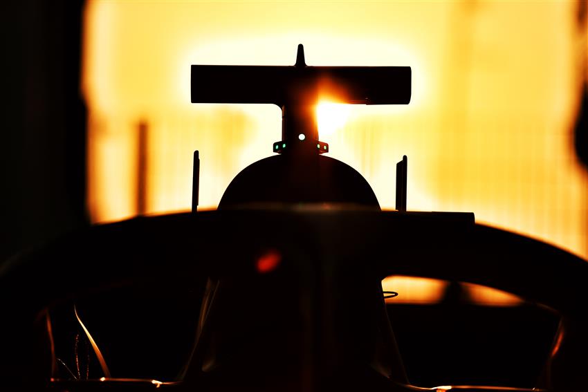 F1 car sunset and silhouette