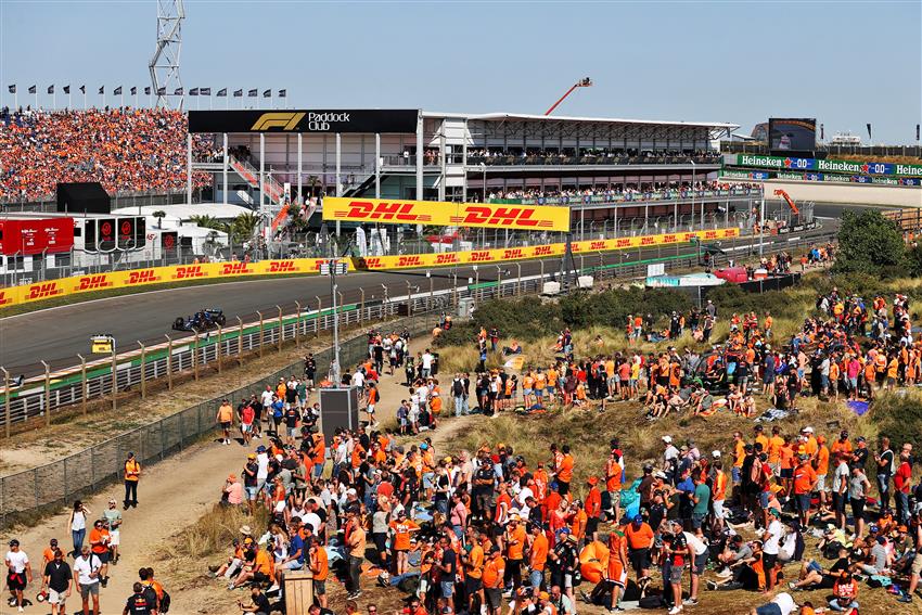 Race fans in sand dunes