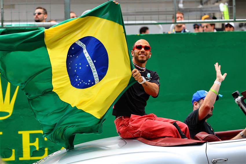 Lewis with a Brazil flag