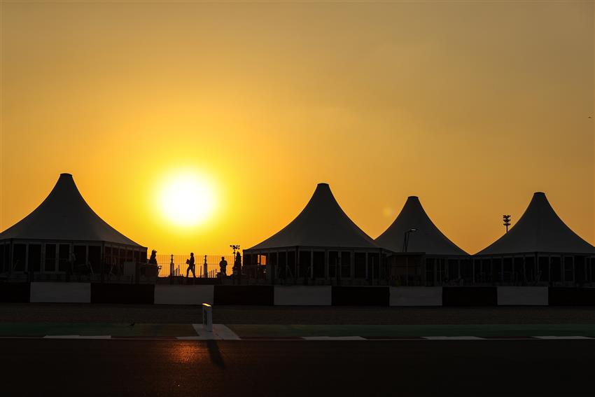 Yellow sunset over hospitality tents