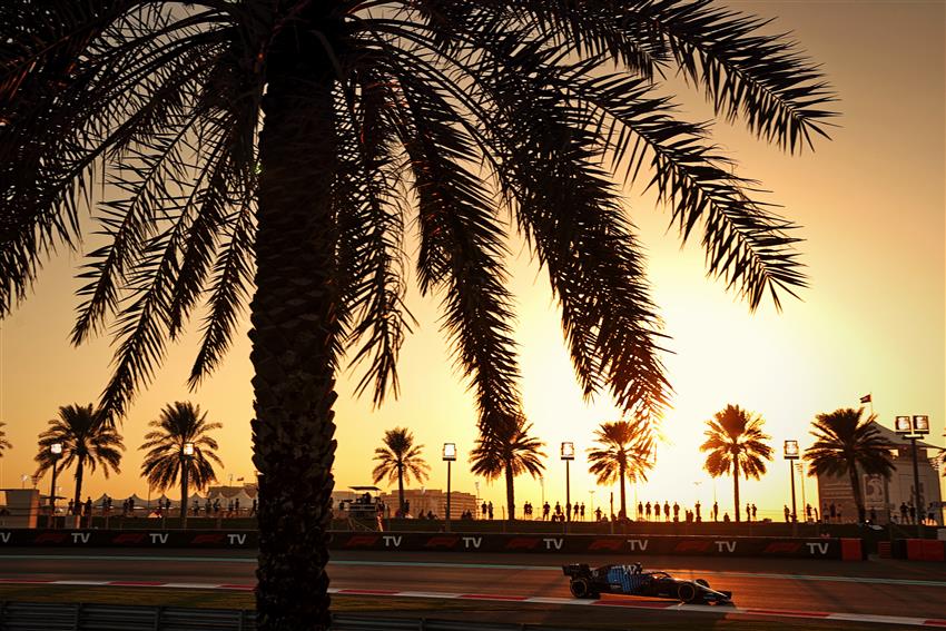 Sunset palm tree and f1 car